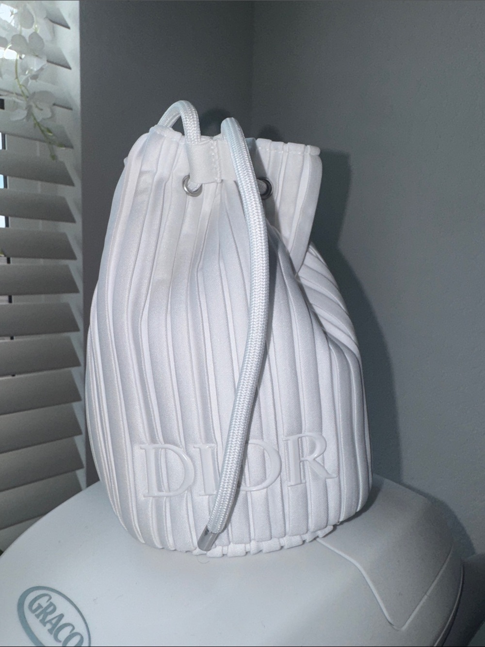 Dior White Draw string pouch with added gold chain